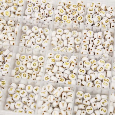 Boite perles blanc or